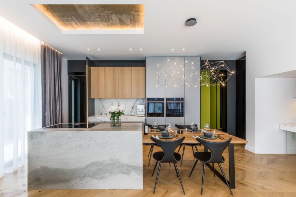Amenajare vila duplex Otopeni stil eclectic - Sergiu Califar - Pure Mess Design - bucatarie minimalista cu insula ciment (3)